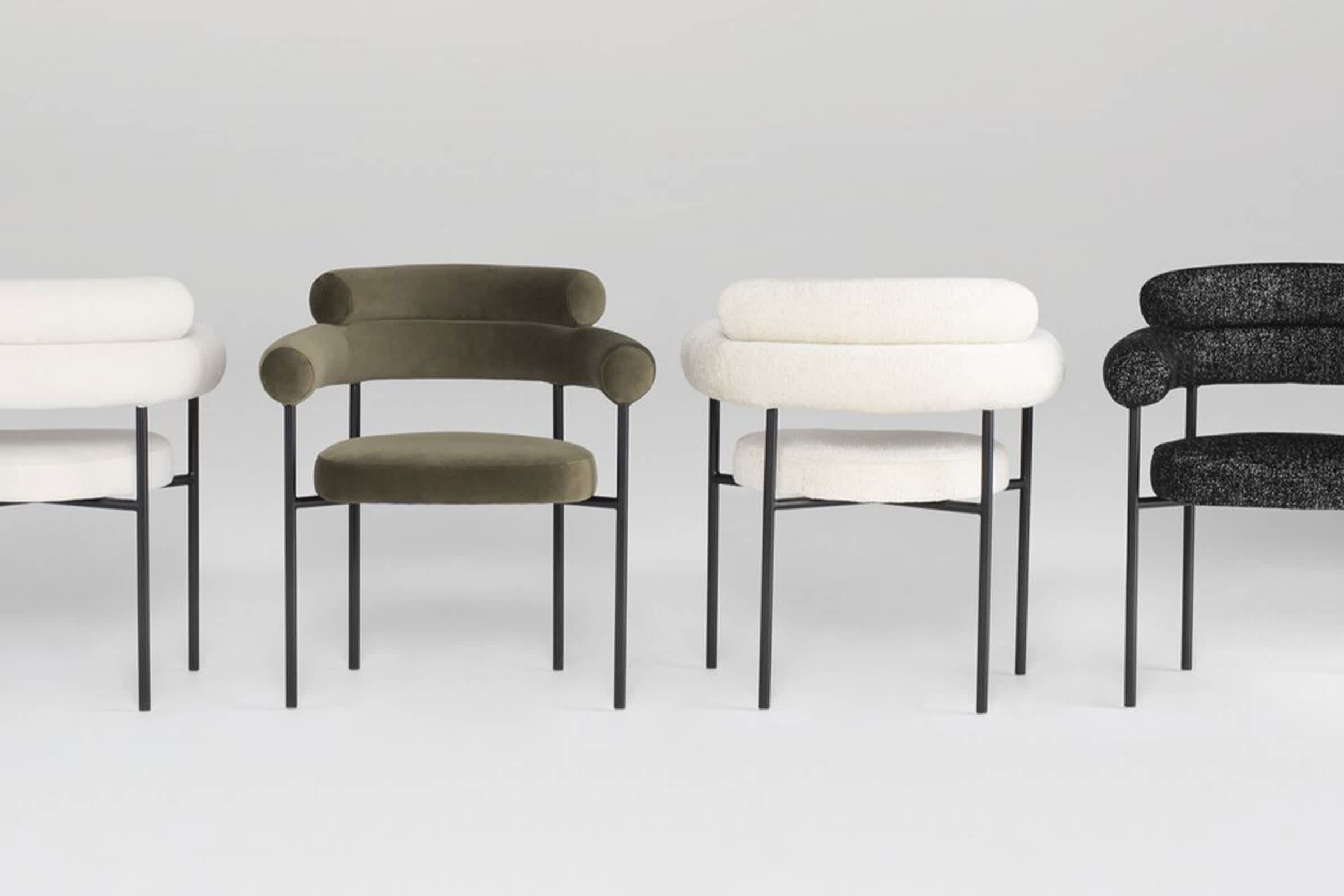 Chair by Nuevo Furniture in assorted colors