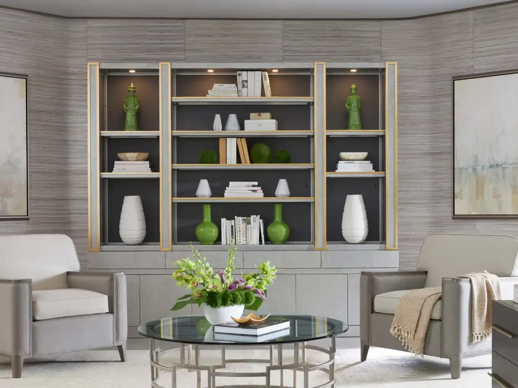 a living room with two chairs and a coffee table by Old Biscayne