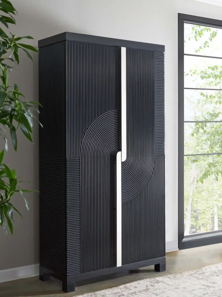 a black cabinet with a white stripe pattern on the front by Old Biscayne